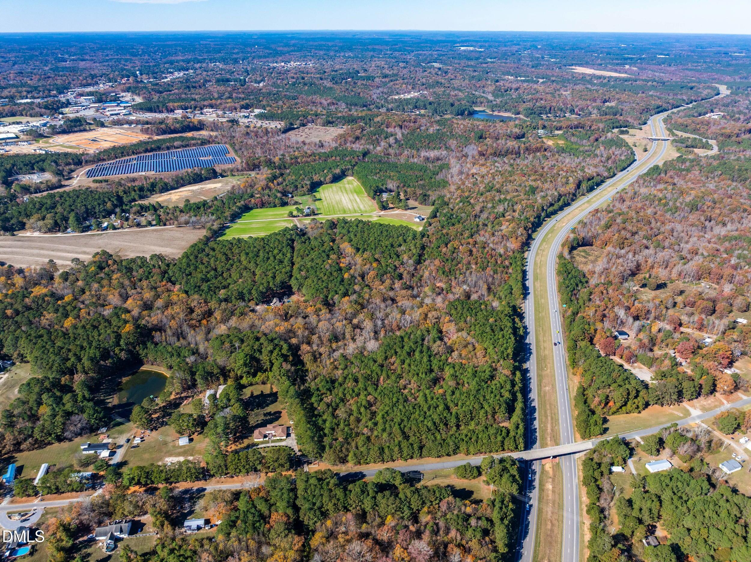 0 Brookcliff Road Sanford, NC 27330 - Photo 13 of 17 an aerial view of residential houses with outdoor space