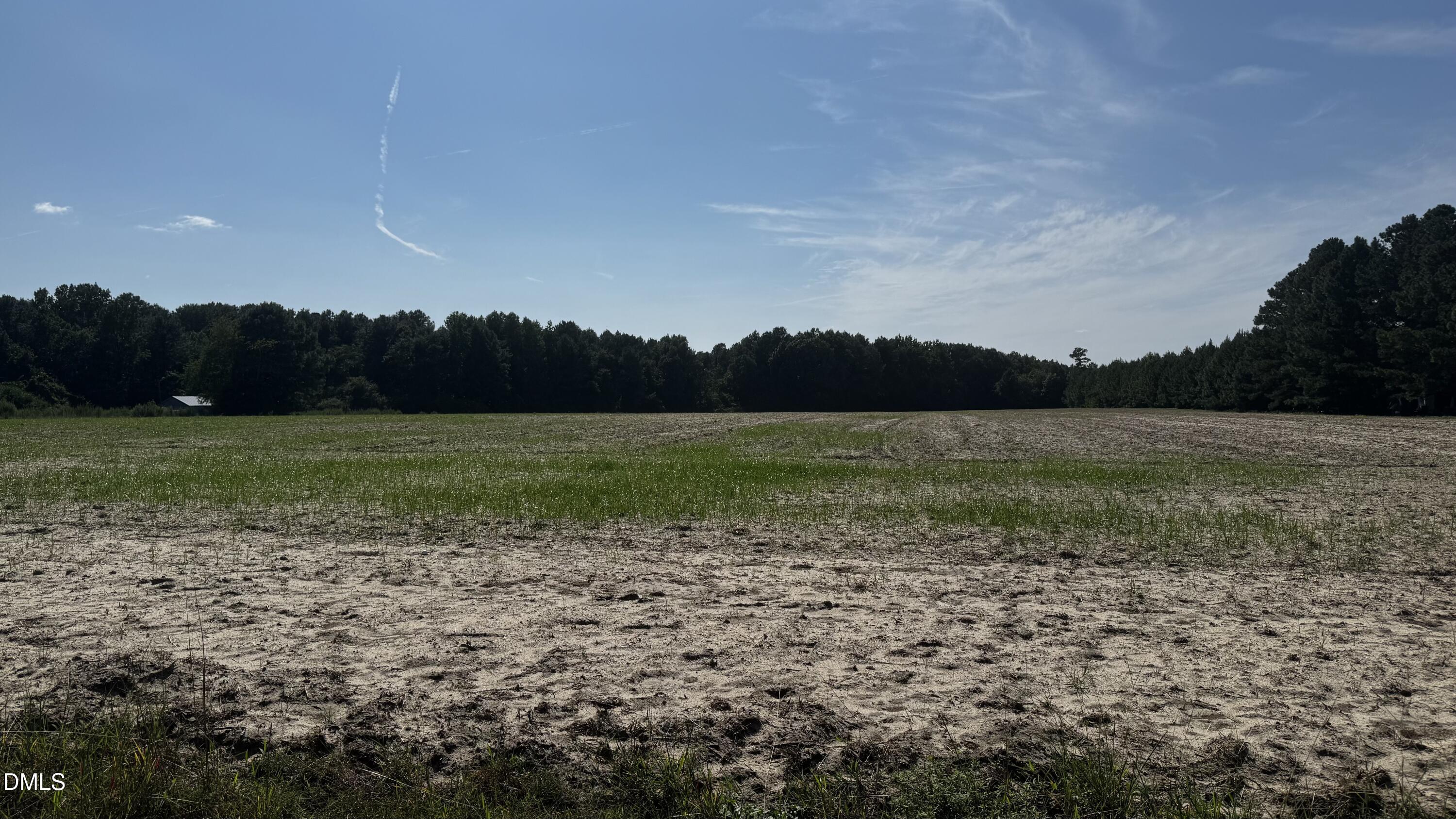 0 Brookcliff Road Sanford, NC 27330 - Photo 15 of 17 a view of a golf course with a lake