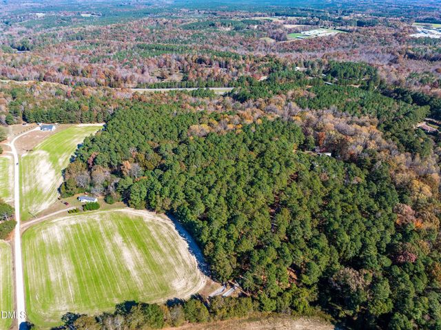 a view of a city with mountains in the background