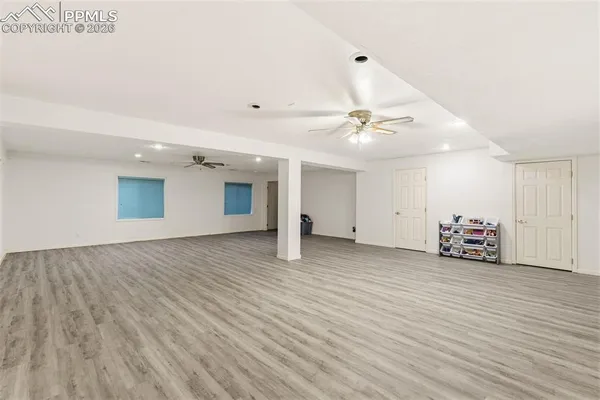 a view of a livingroom with wooden floor
