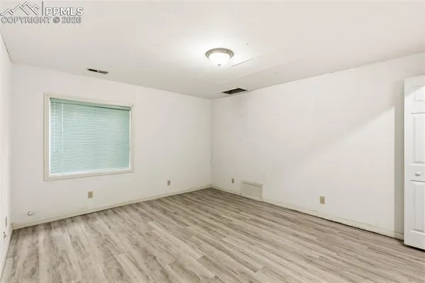 an empty room with a window