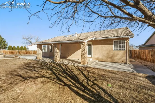 a view of a backyard of a house
