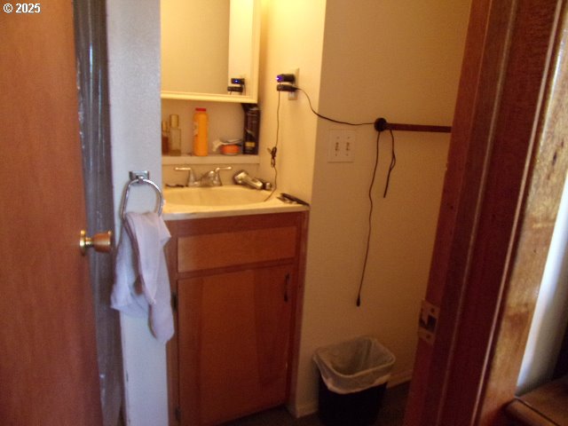 713 Little River Road Glide, OR 97443 - Photo 14 of 36 a bathroom with a sink toilet and shower