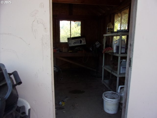 713 Little River Road Glide, OR 97443 - Photo 17 of 36 a bathroom with a toilet a sink and window