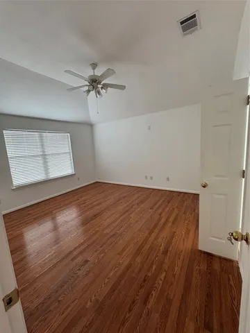 a view of a kitchen with a sink and cabinets