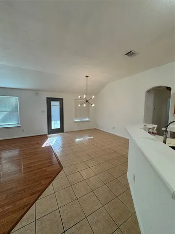 a view of a livingroom with a furniture