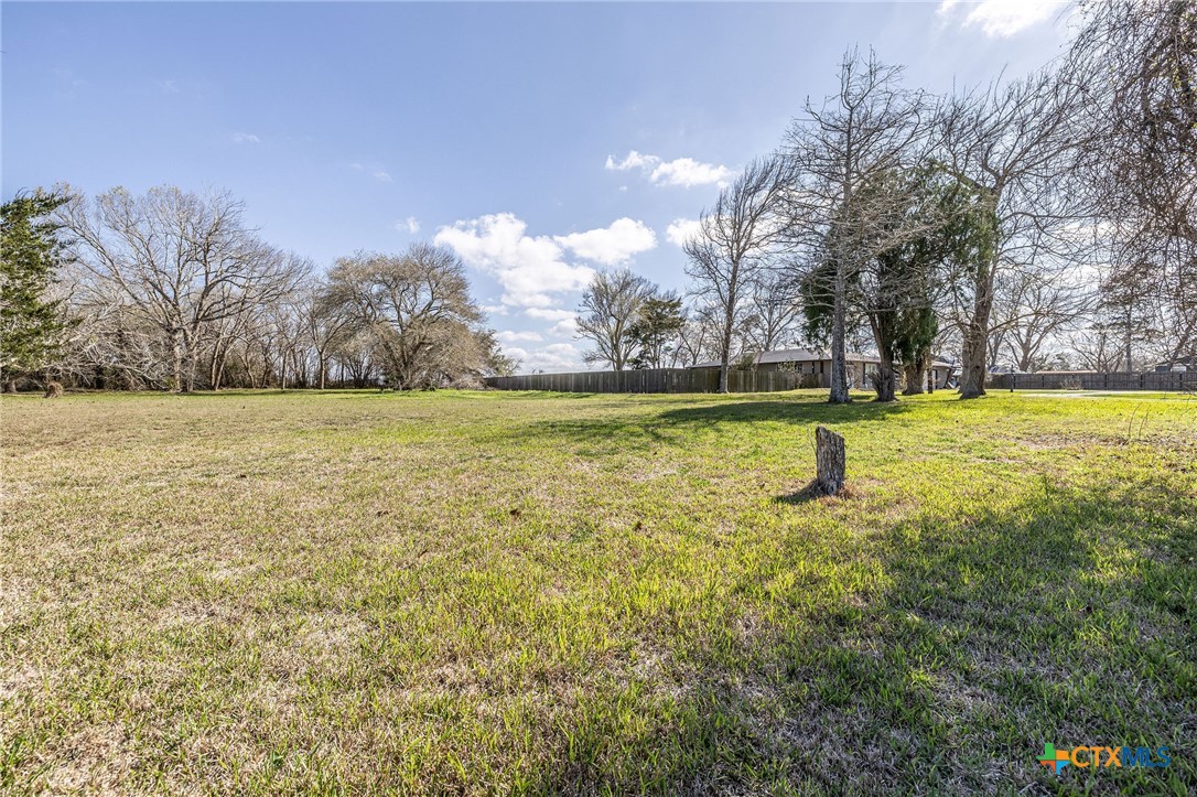 743 Royal Road Port Lavaca, TX 77979 - Photo 14 of 21 a view of a swimming pool and trees in the background