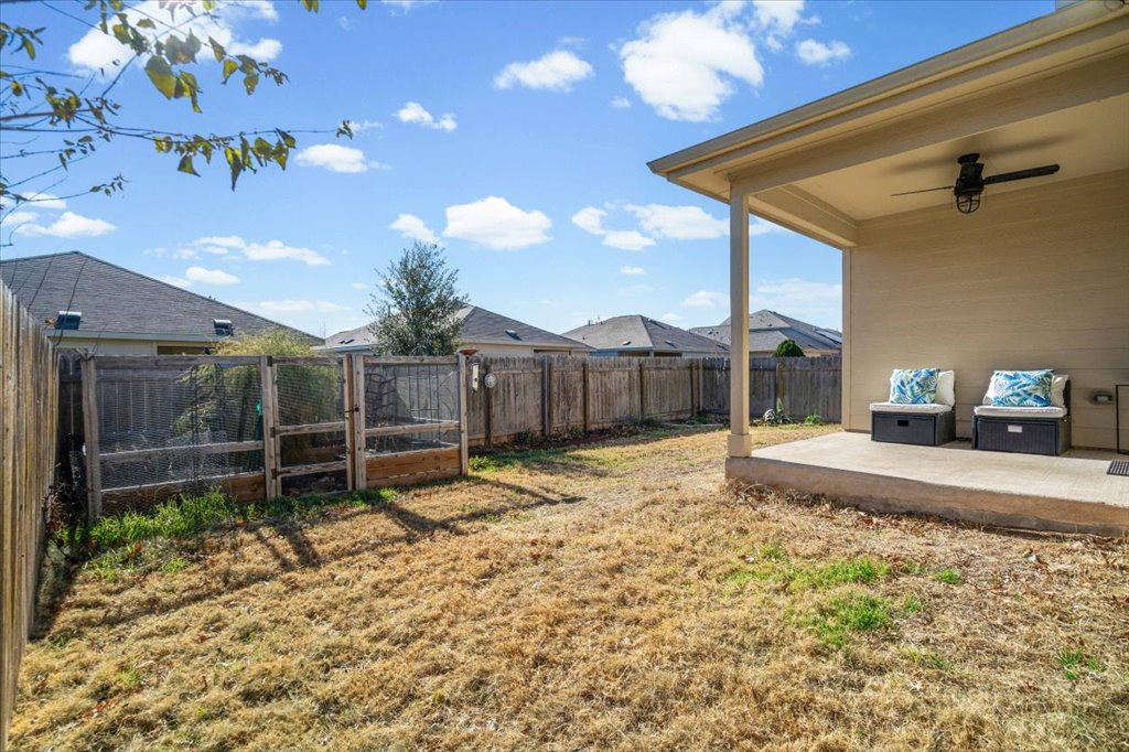 3901 Alpine Autumn Drive Austin, TX 78744 - Photo 24 of 30 Covered patio and fenced garden!