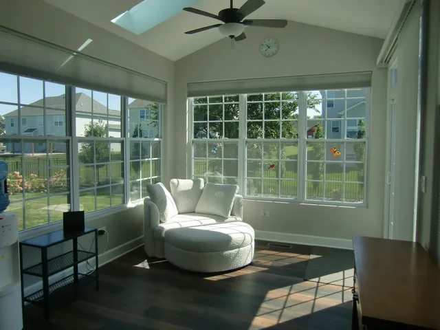 a living room with furniture and a window
