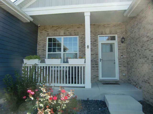 a view of a porch with a bench