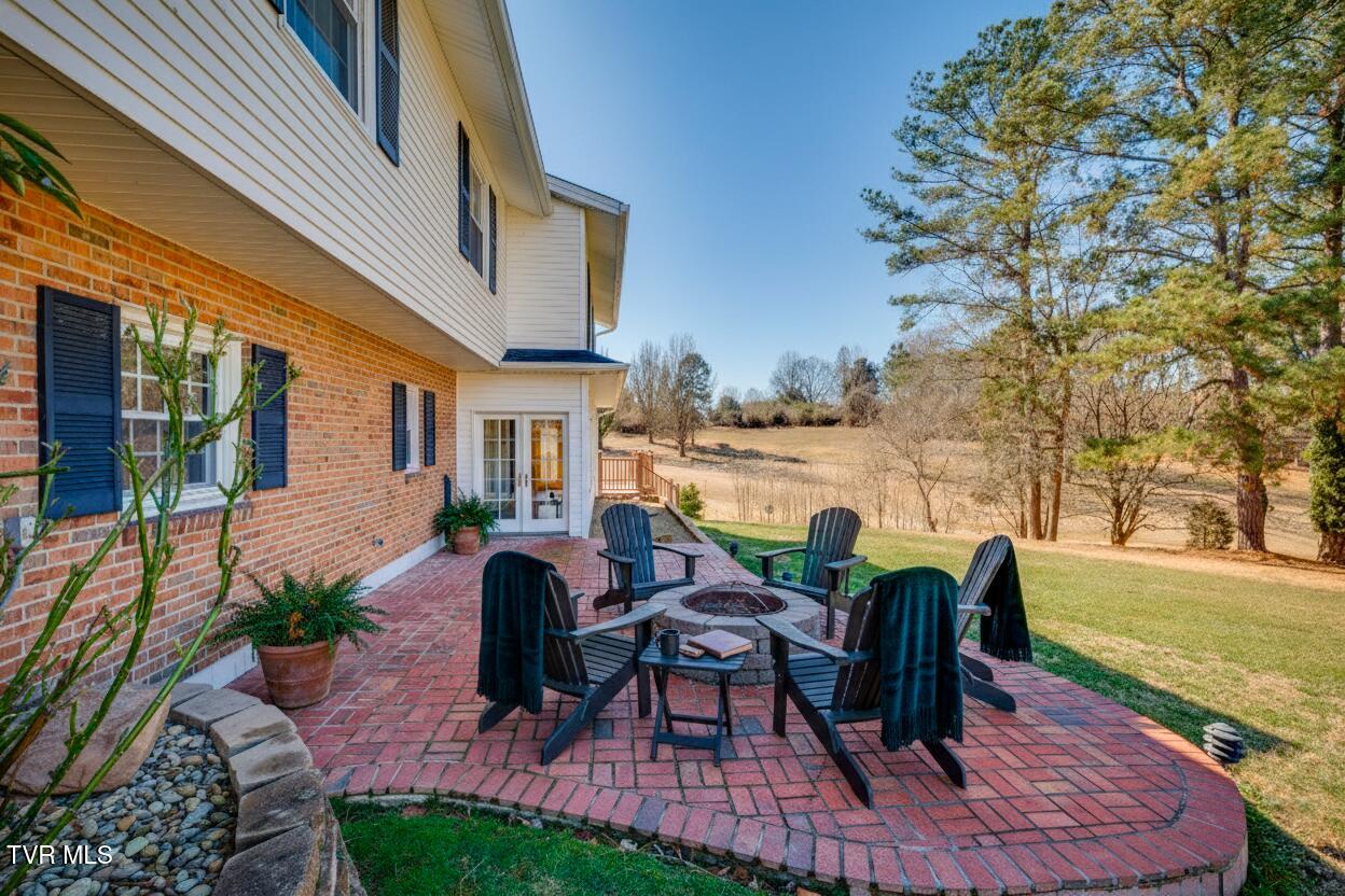416 Manderley Road Kingsport, TN 37660 - Photo 49 of 59 outside-fireplace-table