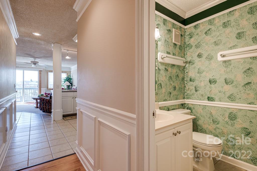 301 Pinnacle Inn Road, Unit 1315 Beech Mountain, NC 28604 - Photo 17 of 47 a bathroom with a sink a toilet and shower