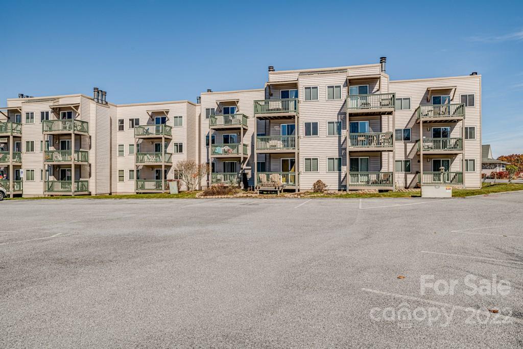 301 Pinnacle Inn Road, Unit 1315 Beech Mountain, NC 28604 - Photo 33 of 47 a view of tall building with a street