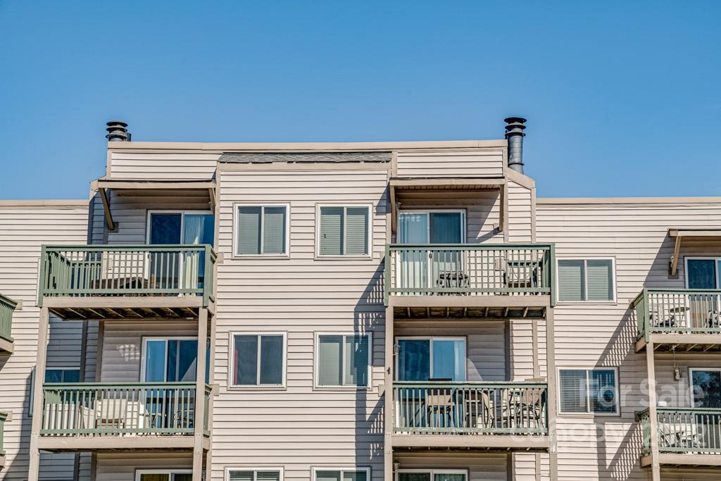 301 Pinnacle Inn Road, Unit 1315 Beech Mountain, NC 28604 - Photo 35 of 47 a front view of a house with a balcony