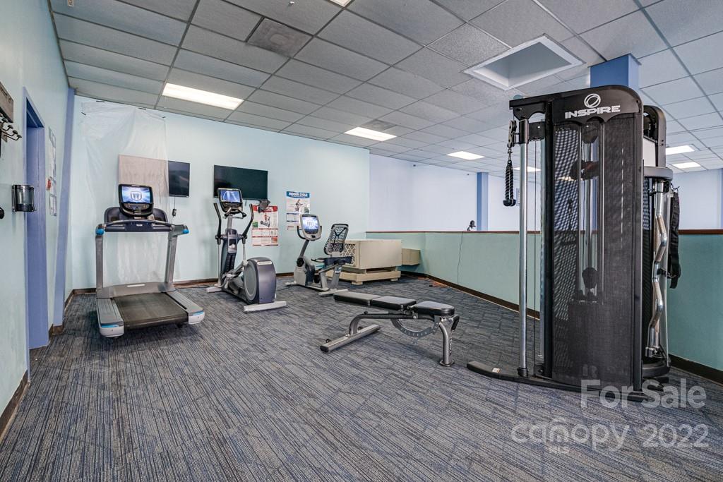 301 Pinnacle Inn Road, Unit 1315 Beech Mountain, NC 28604 - Photo 42 of 47 a view of a room with gym equipment