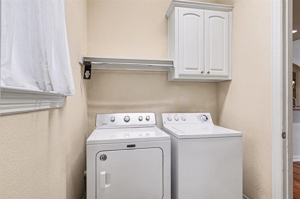 5508 Junius Street Dallas, TX 75214 - Photo 19 of 34 a utility room with dryer and washer