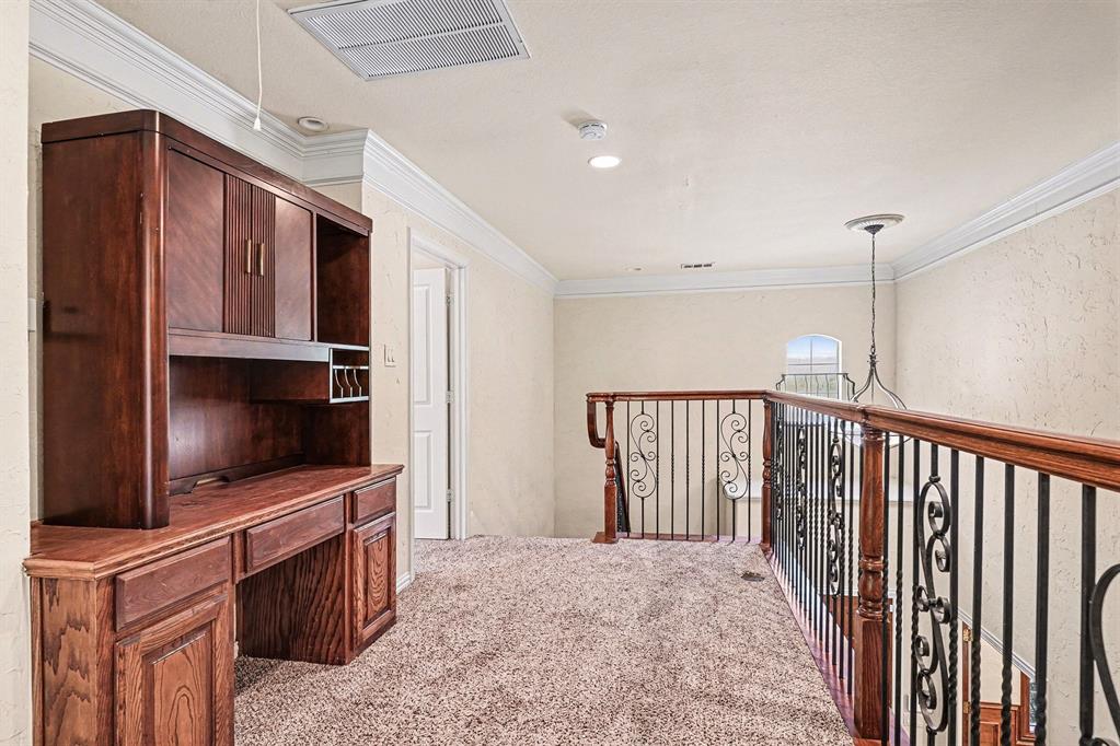 5508 Junius Street Dallas, TX 75214 - Photo 20 of 34 a living room with furniture and a flat screen tv