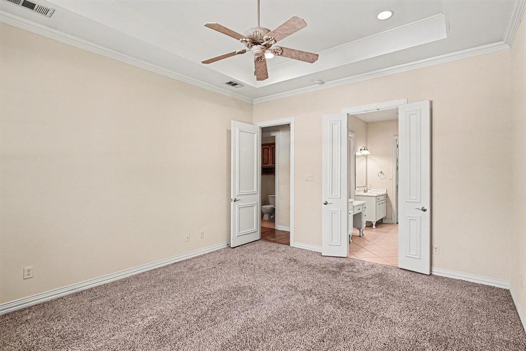 5508 Junius Street Dallas, TX 75214 - Photo 22 of 34 wooden floor in an empty room and a ceiling fan