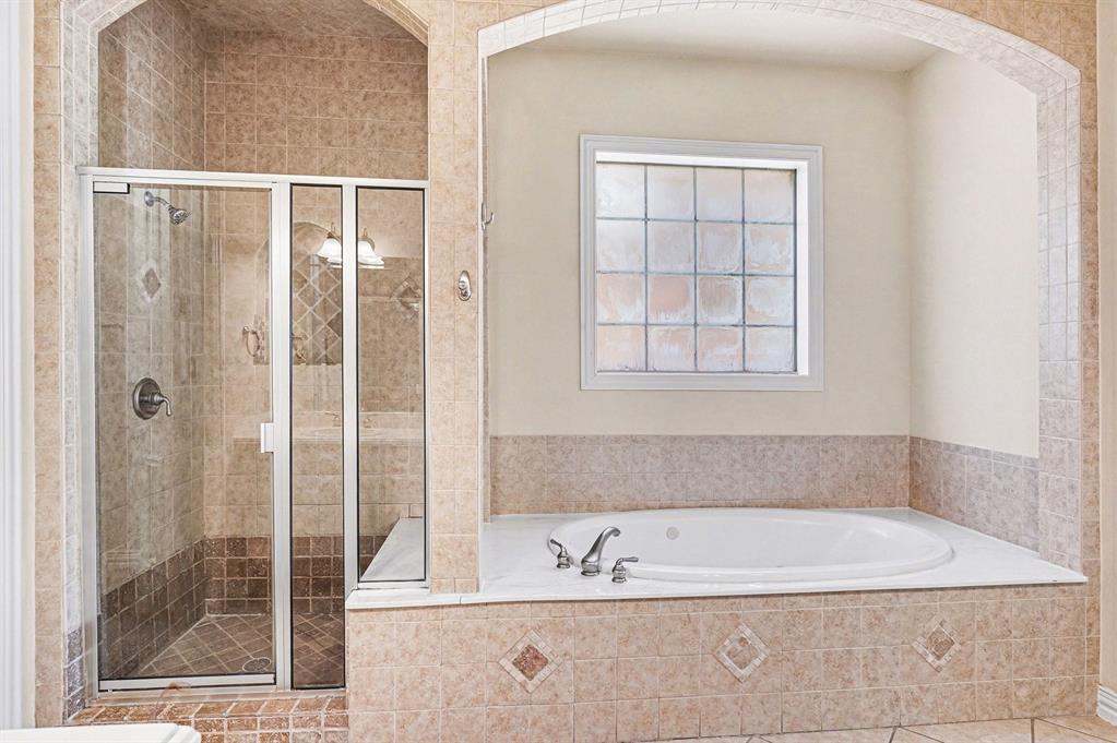 5508 Junius Street Dallas, TX 75214 - Photo 24 of 34 a bath tub sitting next to a window