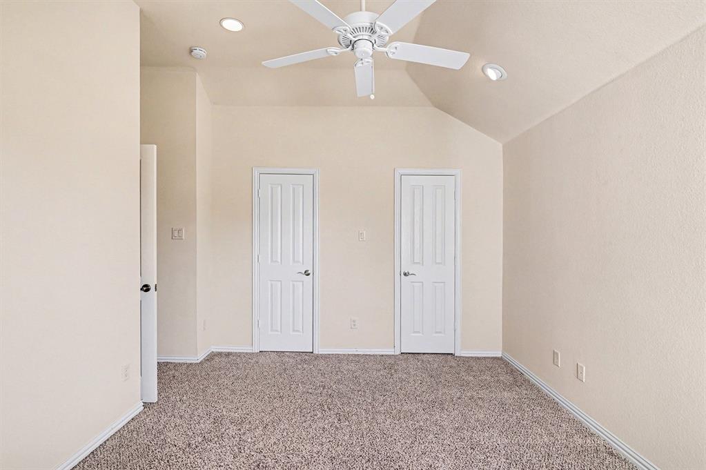 5508 Junius Street Dallas, TX 75214 - Photo 28 of 34 an empty room with fan and entrance