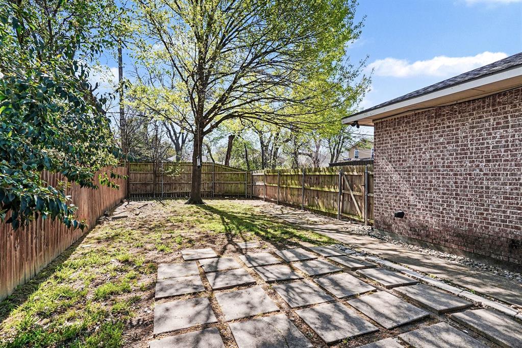 5508 Junius Street Dallas, TX 75214 - Photo 34 of 34 a view of backyard with wooden fence