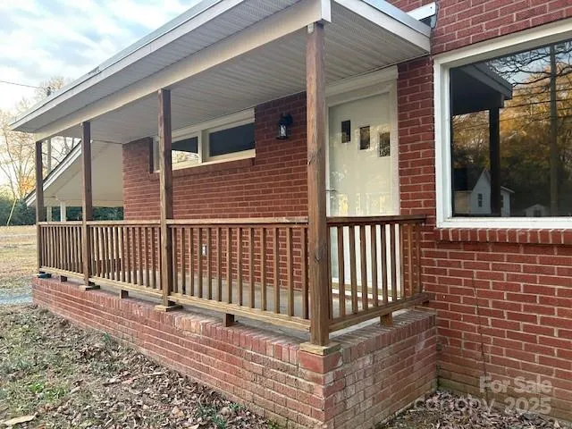 a view of a balcony with a swing