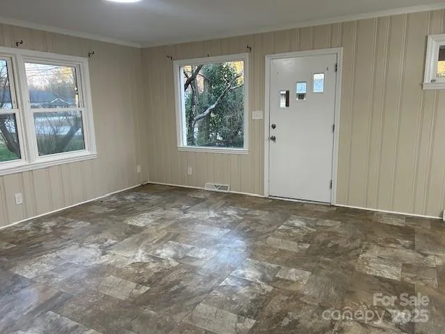 an empty room with windows