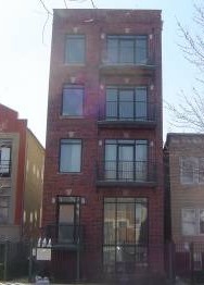 1915 West Huron Street, Unit 2 Chicago, IL 60622 - Photo 1 of 23 a building view with a glass door
