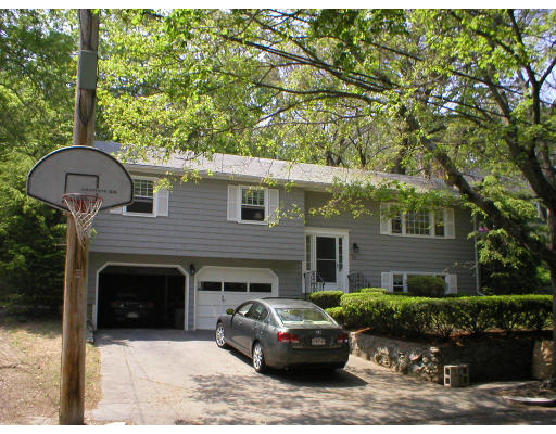 78 Columbia Road Arlington, MA 02474 - Photo 1 of 14 a front view of a house with a garden