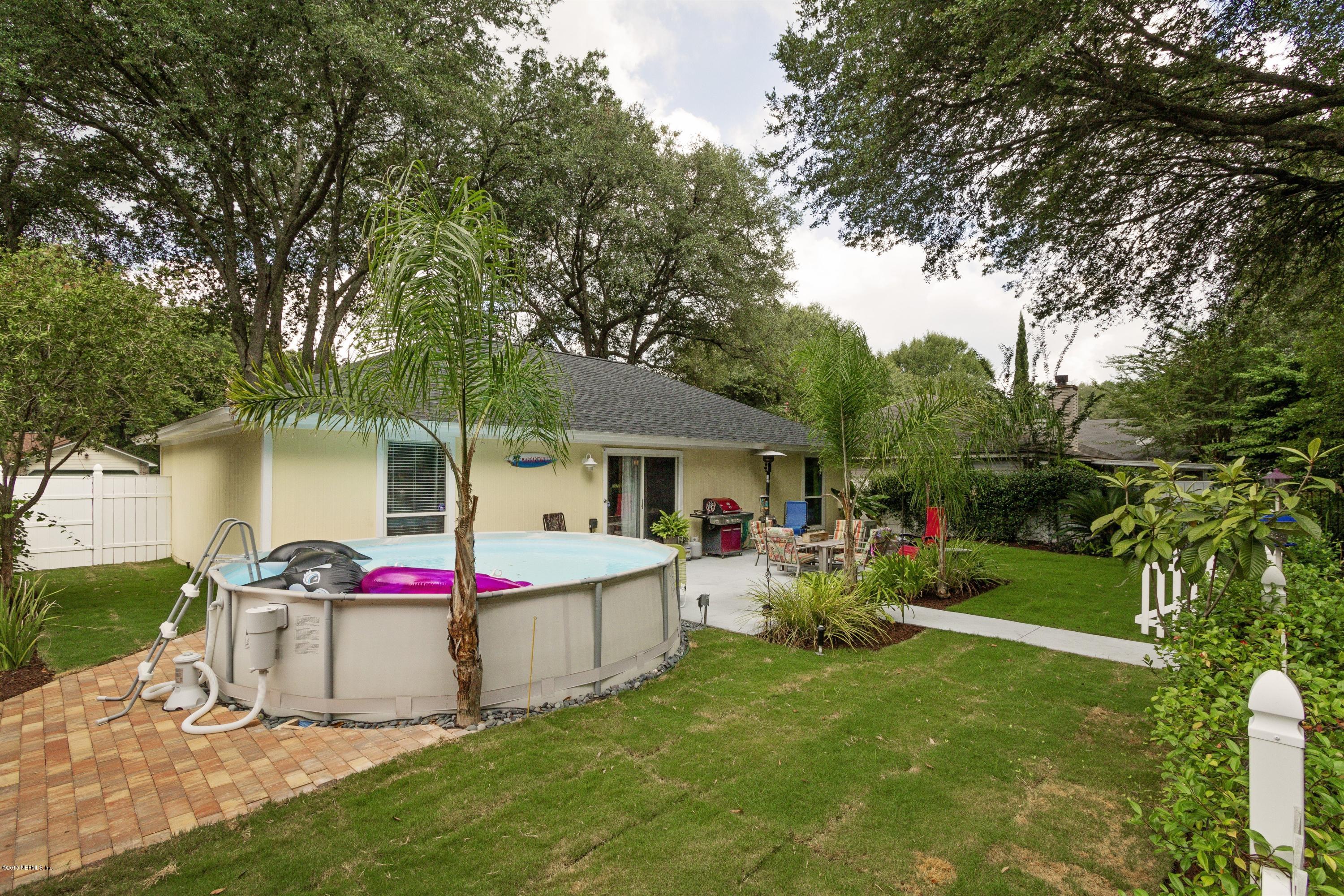 12745 Moose Road Jacksonville, FL 32226 - Photo 24 of 26 a front view of house with yard and trees