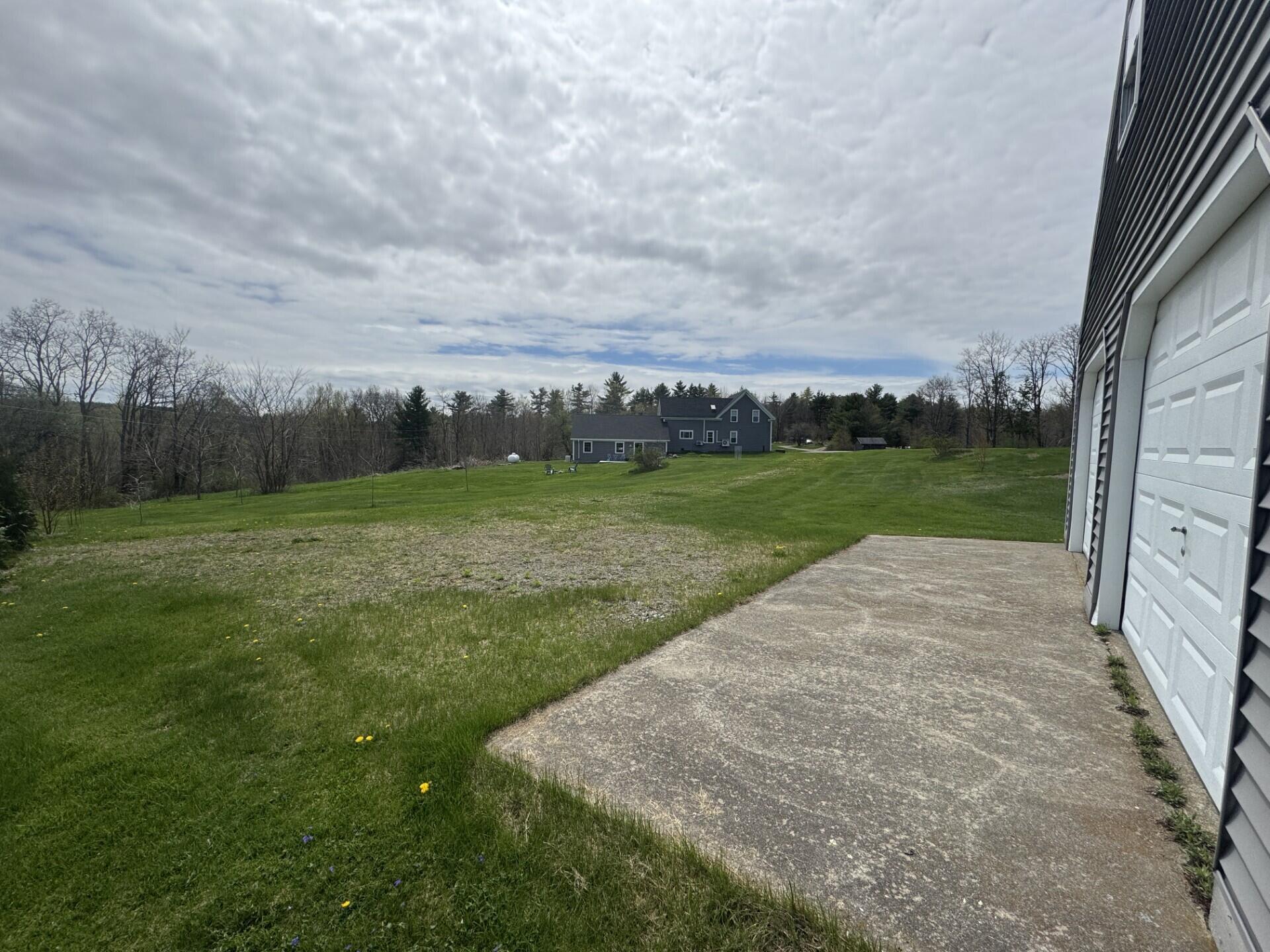 122 Clark Road Unity, ME 04988 - Photo 34 of 34 Detached garage and back yard