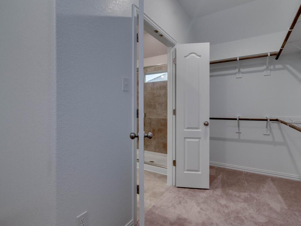 1104 Ridge Runner Drive Georgetown, TX 78628 - Photo 17 of 27 a view of an empty walk in closet