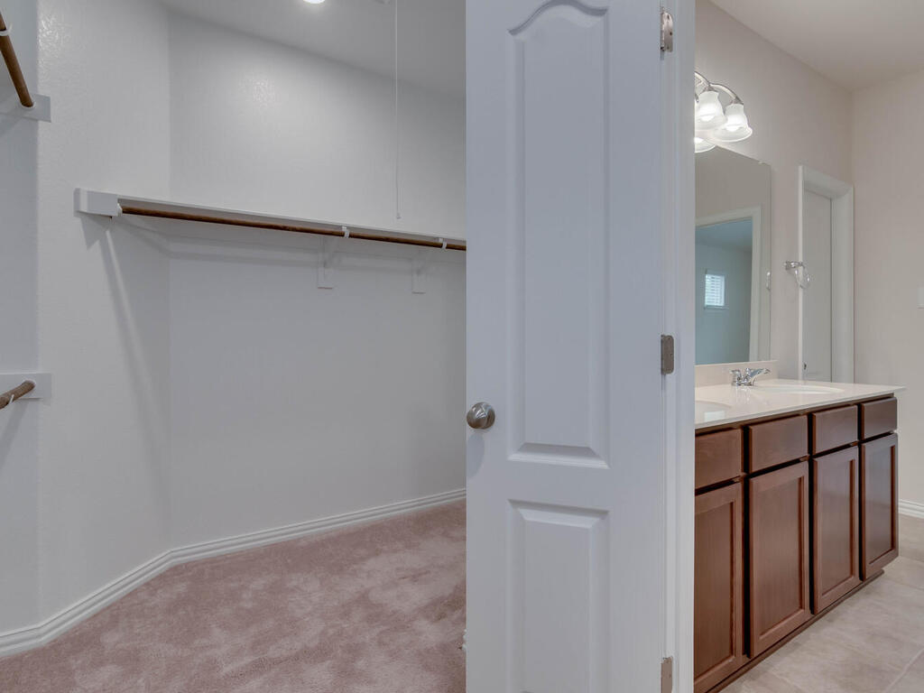 1104 Ridge Runner Drive Georgetown, TX 78628 - Photo 18 of 27 a bathroom with a shower and a sink
