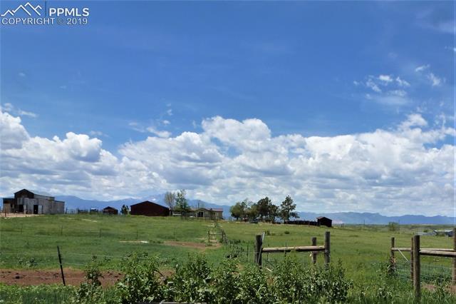 3460 Meridian Road Peyton, CO 80831 - Photo 5 of 7 Looking down the fence dividing the two pastures for rotation