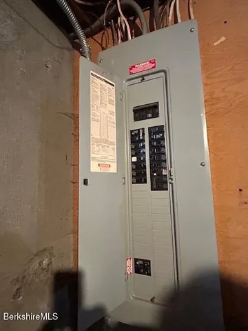 a view of a hallway with washer and dryer