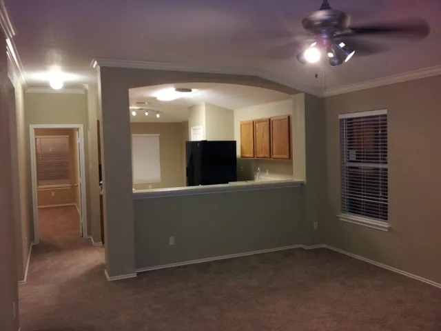 a view of a hallway with closet