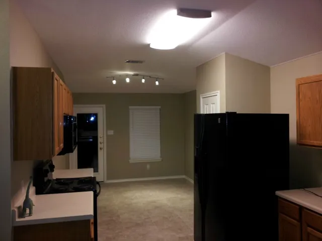 a view of entryway with bathroom