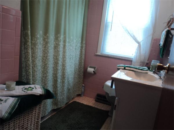259 Mallowhill Road Springfield, MA 01129 - Photo 11 of 11 a bathroom with a sink and a mirror