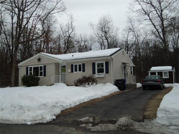 259 Mallowhill Road Springfield, MA 01129 - Photo 2 of 11 a view of a white house covered in snow