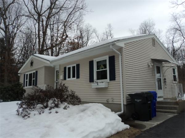 259 Mallowhill Road Springfield, MA 01129 - Photo 3 of 11 a front view of a house with a yard