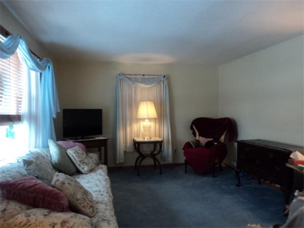 259 Mallowhill Road Springfield, MA 01129 - Photo 6 of 11 a living room with furniture and a flat screen tv