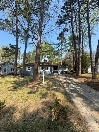 a view of a house with swimming pool