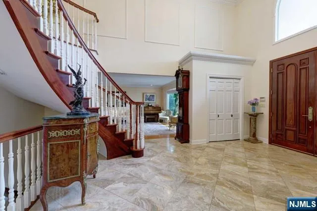 a view of entryway with stairs and furniture