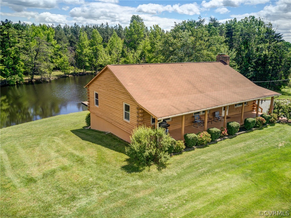 2834 Venable Road Kents Store, VA 23084 - Photo 1 of 47 an aerial view of a house having yard and a garden