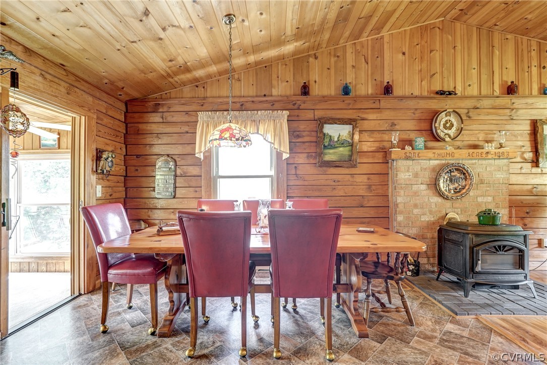 2834 Venable Road Kents Store, VA 23084 - Photo 18 of 47 a view of a dining room with furniture and chandelier