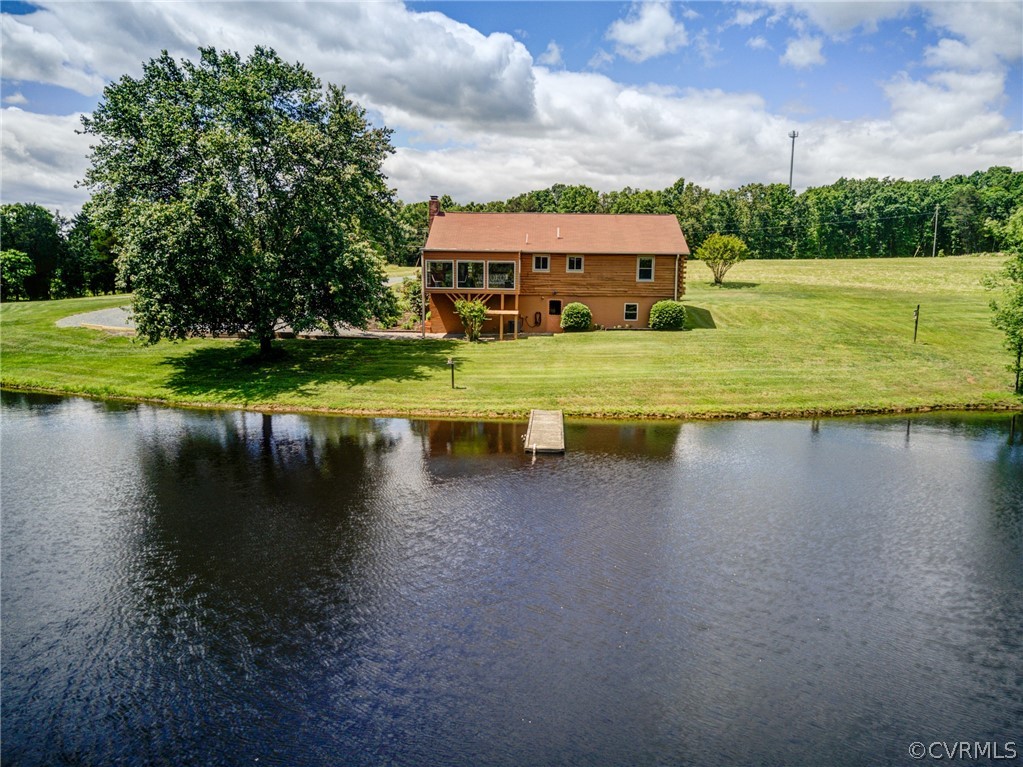 2834 Venable Road Kents Store, VA 23084 - Photo 2 of 47 a view of a lake with houses in the background