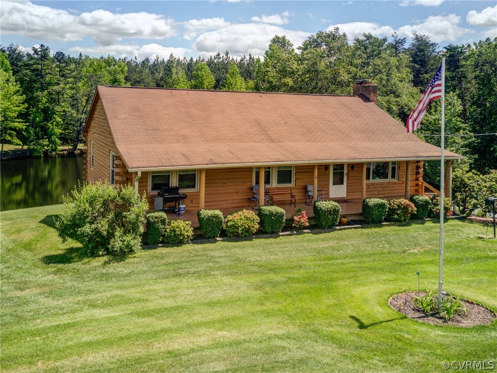 2834 Venable Road Kents Store, VA 23084 - Photo 3 of 47 a aerial view of a house with a yard table and chairs