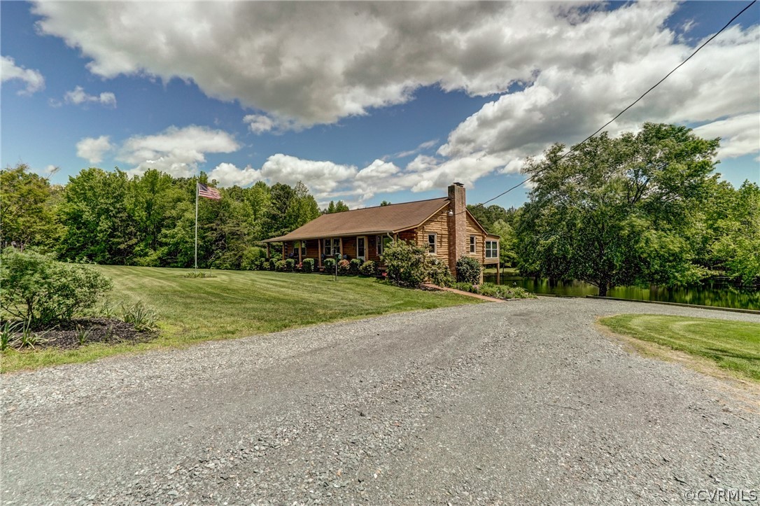 2834 Venable Road Kents Store, VA 23084 - Photo 45 of 47 a view of a house with yard and a yard