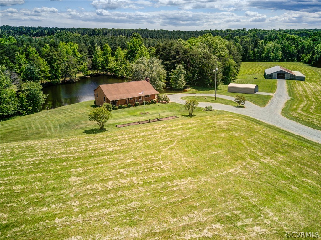 2834 Venable Road Kents Store, VA 23084 - Photo 5 of 47 a view of a swimming pool with a patio
