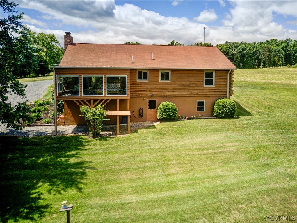2834 Venable Road Kents Store, VA 23084 - Photo 7 of 47 a front view of a house with yard and green space